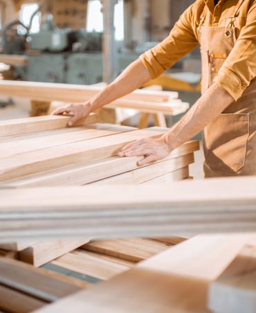 Carpenter choosing pine planks in a carpentry workshop warehouse. Preparing raw materials for the future woodwork SSUCv3H4sIAAAAAAAACpxW247bIBB9r9R/iPxcS1xsY/orVR8wkITGBhfjXa1W++8d37LYbLtR38JwmDlz8Zy8fv1yOmWNGIzMvp9epxOcTduOQ/AiGGfBjL6tdq+t0j62PHlaodiglQnOG9HGxkYEebWi02C0Y9tO5rf5MhuCCOOghyj6cB1D0H4ITt7ATO+uhx6OeDsK5Rq9gXDkUoqgL8Bh53RL8cdyPm0X8yW8gKssW10vLMZmtm2mxfl/vVx+/LwTv2grXyZubxFrr1stlkKsHDNEeCEKrnNFMc+LqtR5Q2WTl6KuOGaI1ZzMURbX2e0ZytbFWfetsLfIJZhqeLS8iig9O3/rhN0BK1xidgRK4XttIcwOyhDixV+g/mUH5TXFSXjpxTkMPfTcHTkwRlOyTk2EHyExYfceCSX4iLoKq17S/P8R29jL52lNwOHq+r1bVKUElgI8xOAqvEqywoQRlMT/5Yx9tEgT1wcbdXBY1h8k7pS2n9c9CQoZp/Rad7kc680YoclwNg5q89iwH8pSYcrqIw7aMZ6FDKM/RgeaJT/C9e/R9B1M/KHd0O8j1FjYruNHWJZkP3/Cnycl3exTris7dlrwZIiC6ZpjCQjGCe44kbwqy6SLxqpJLfbfeYVKlCDb8bGwvXdnPQyQyqwju51Ekwp1otUJS5T4/GC7IIQSb81o2kXkos8L0aq4s4yWthiVcdG+fXJStNO+pRGo90YuE/S6Wly4zhG2Z9KN66LMCObZ++C7XjRzcmdwq99XwDDAC7XZY+2DTrguCmVdmDVllahMgThOR0xJSRAvC14zUjBEURYL8tWAn5nRxnHsWyeUnoLeBfAo1bhCrCS85MVdDzfVhpsKVlQd3ewFfAZgTGYlf5fbSU07A0E+D0xRTea6r5J7/4cBGKP+8Q8jwzVDMFoVWVbK+tBMITMi64qeS5prTZoc9LjIBVVVXiqFyJljWfBpzt/+AAAA//8DAA84vSBKCQAA